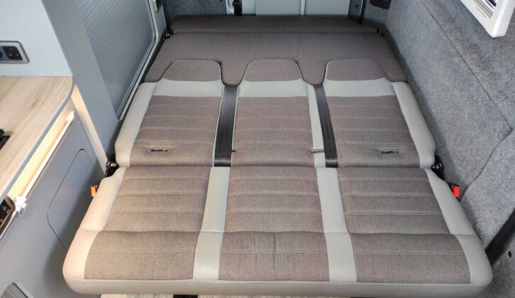 The downstairs bed made up with the headrests slotted into the rear panel