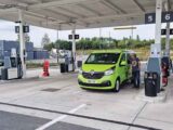 A campervan at a fuel station