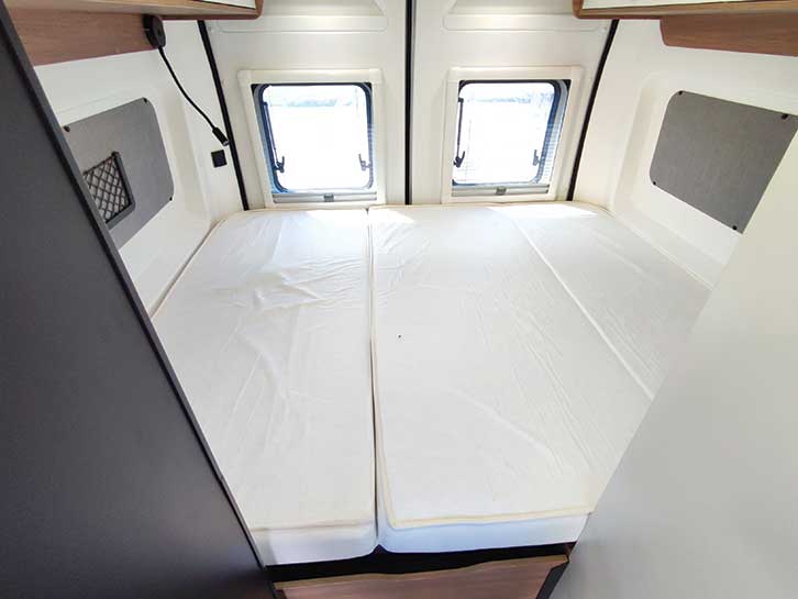 The transverse bed in the Pilote campervan.