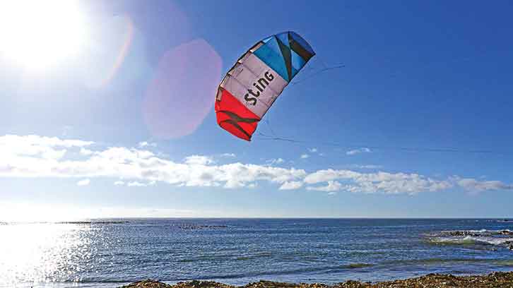 A Flexifoil Kite flying over the sea