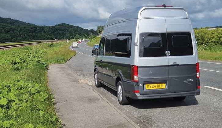 The VW Grand California 600 from the rear on the road