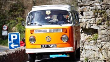 A campervan on a narrow road