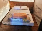 The bed in the glamping tent