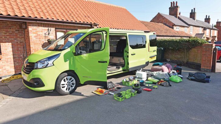 A campervan with all of its kit unloaded