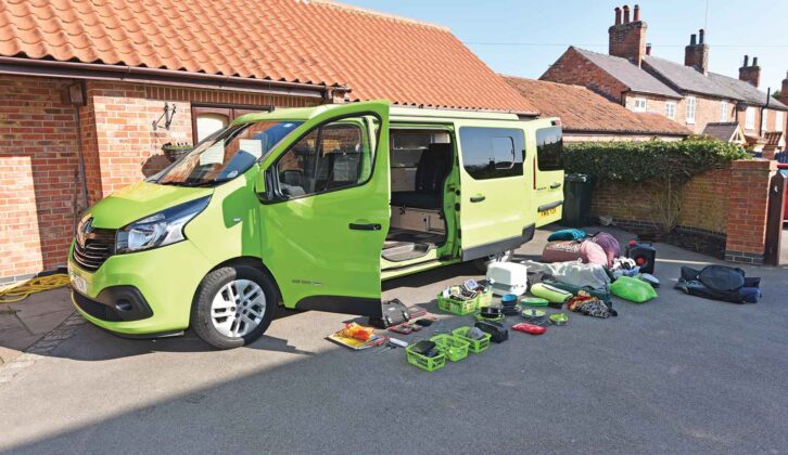 A campervan with all of its kit unloaded