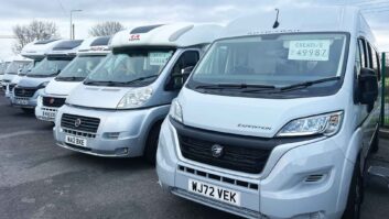 Vans on a dealer forecourt