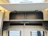 The overhead locker over the rear doors